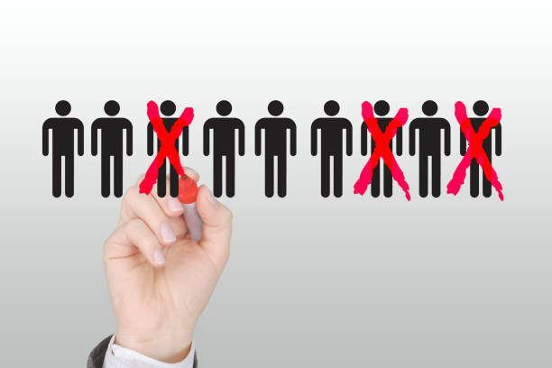 Businessman cutting back job, workforce reduction